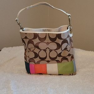 Well-loved Big C Coach rainbow patch handbag